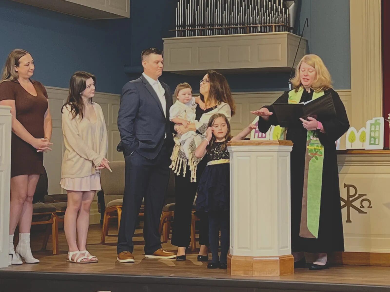 A family celebrating baptism